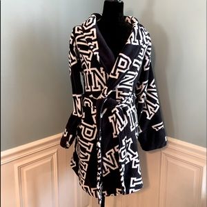 Pink black and white robe